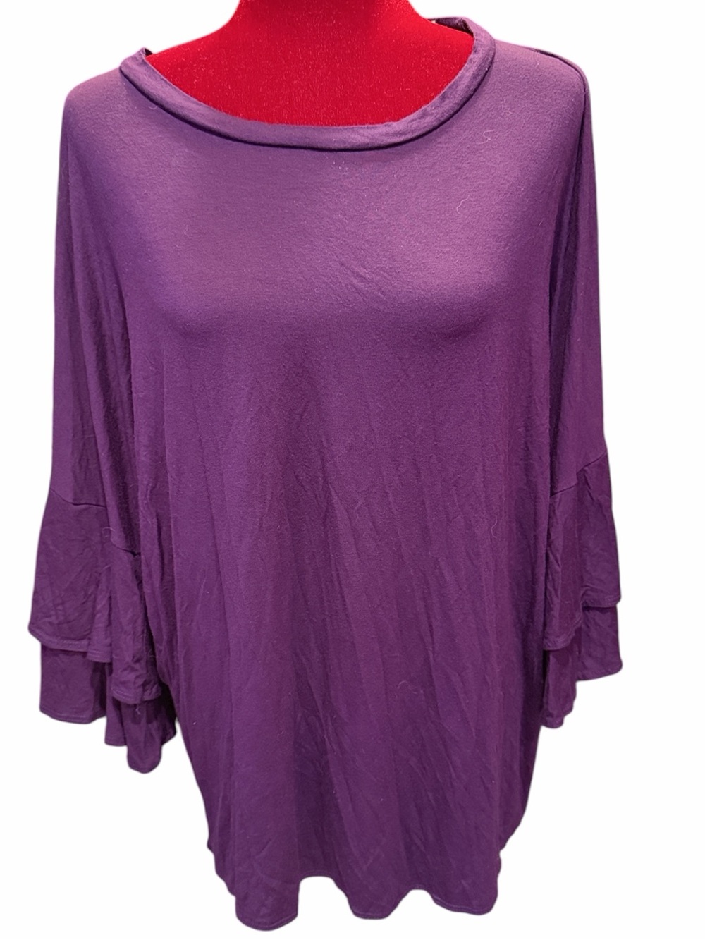 #751.• 4/$32• Purple flutter sleeve blouse. 1x